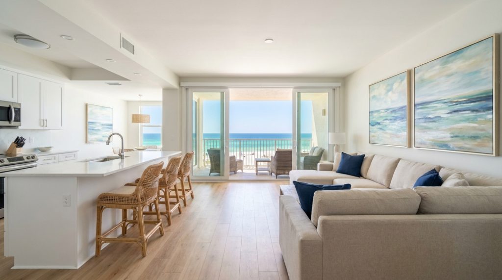 Bright vacation-rental condo interior with a Gulf view
